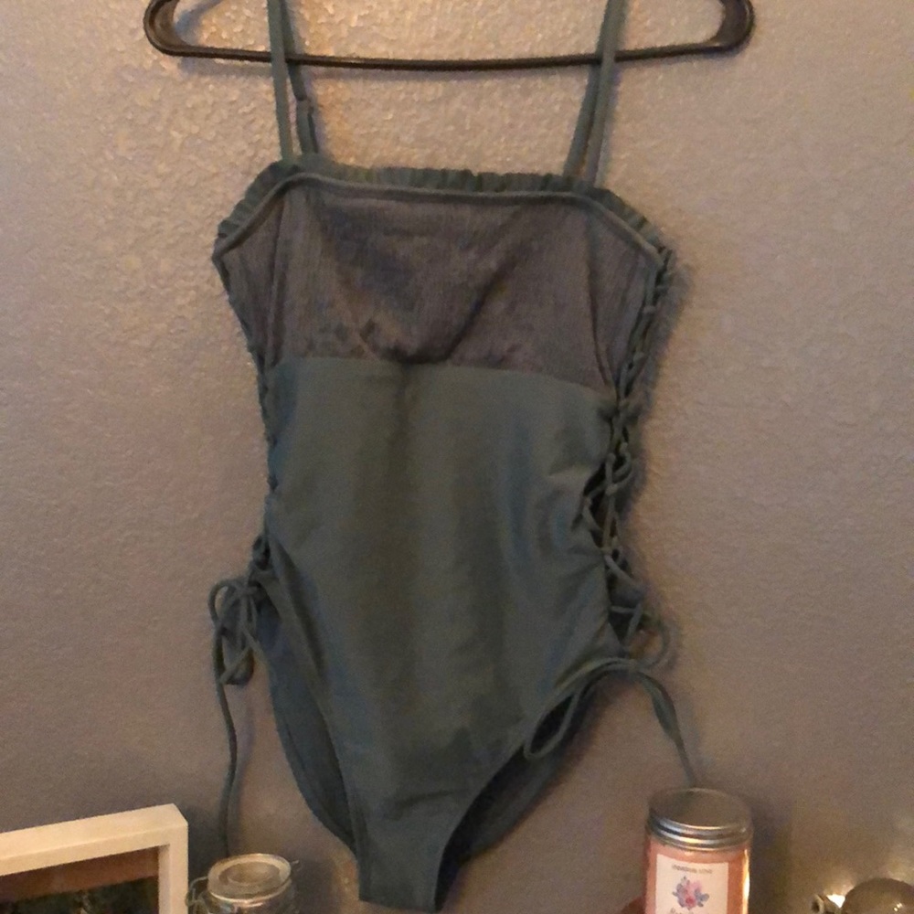 Turquoise one piece side tie swimsuit
